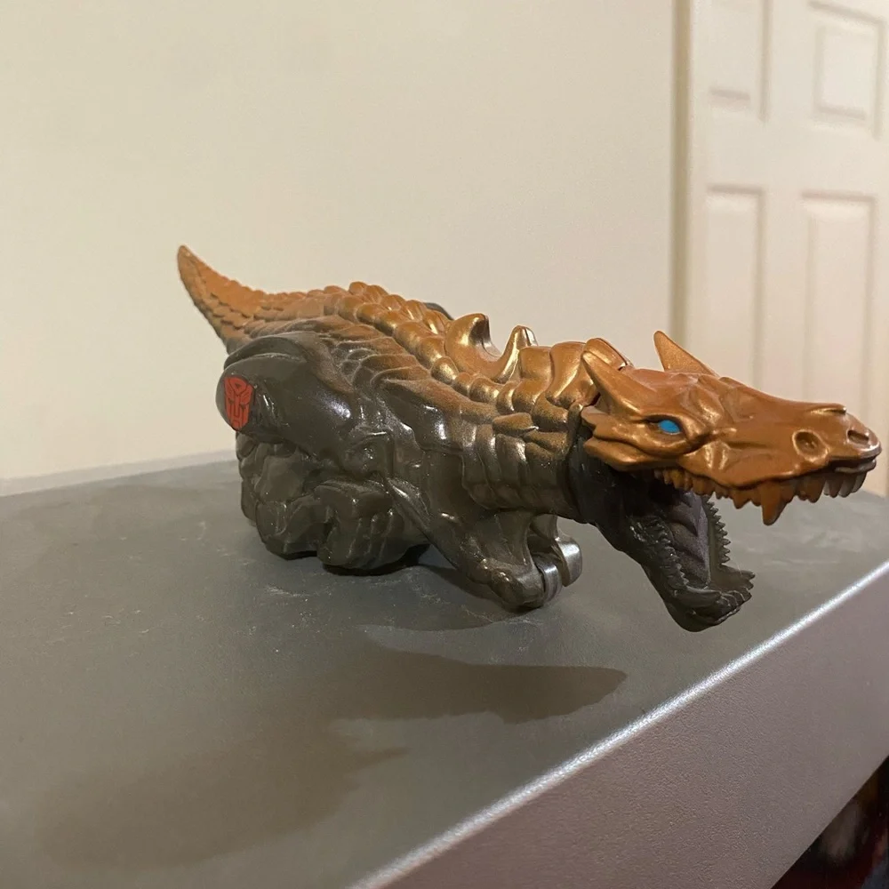 Transformers Autobot Dinosaur Action Figure